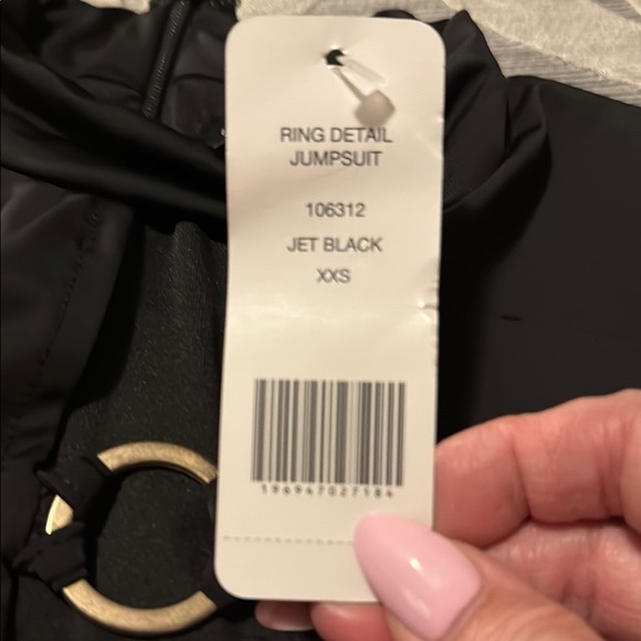 Bebe Black Sleeveless Jumpsuit with High Neckline & Ring Detail Sz XXS - Picture 9 of 9